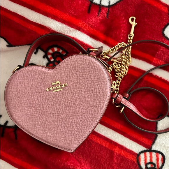 Coach Handbags - Coach Heart-Shaped Pink Crossbody Bag with Gold Accents